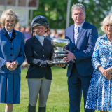 Ros receiving the Laurence Rook Trophy for best British rider not to have previously completed Badminton, with the Duchess of Beaufort, Lance Bradley and the Duchess of Cornwall © Trevor Holt